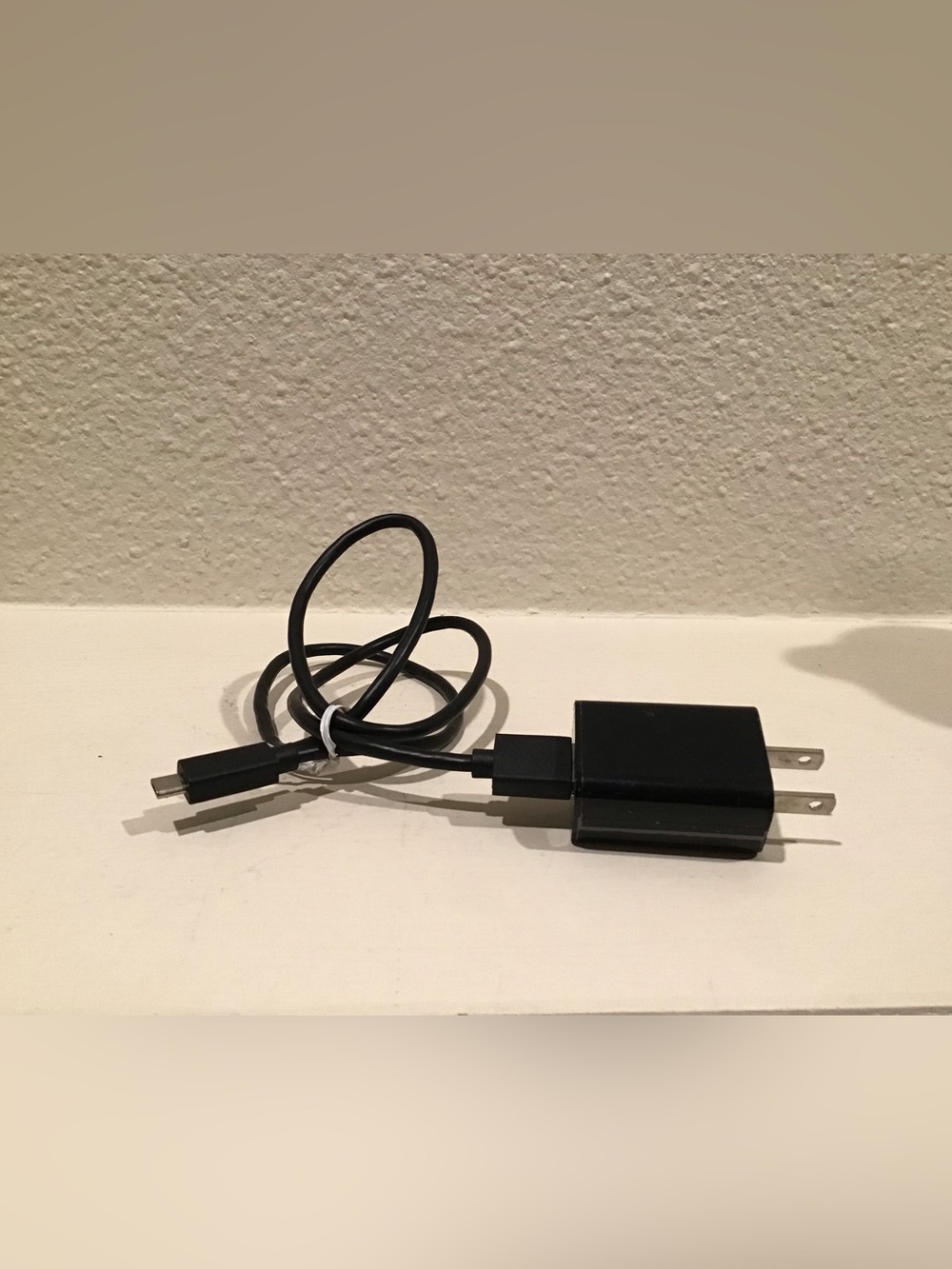 Amazon Black AC Adapter with White Label and cable.